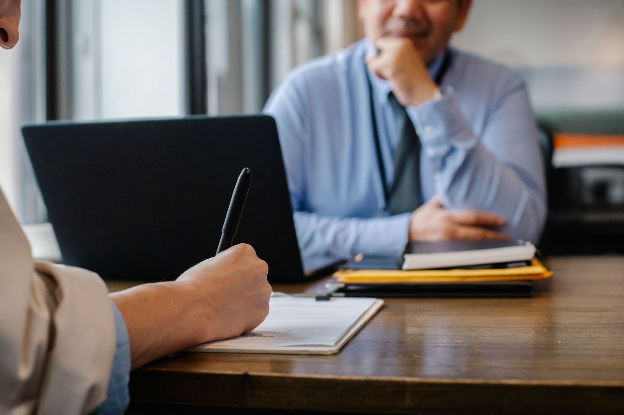 Support specialist with headset assisting a customer